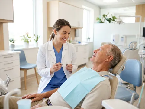 Dentist consulting with a patient